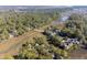 Scenic aerial view of lush marsh lands and river ways in established community at 1409 Dune Loft Villas, Seabrook Island, SC 29455