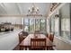 Charming dining area filled with natural light, adjacent to the kitchen and showcasing a wood table at 1409 Dune Loft Villas, Seabrook Island, SC 29455
