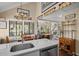 Spacious kitchen with stainless appliances and island which opens up to the living room area at 1409 Dune Loft Villas, Seabrook Island, SC 29455
