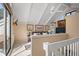 A living room with a ceiling fan, a leather couch, and carpet at 1409 Dune Loft Villas, Seabrook Island, SC 29455