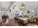 Open living room with hardwood floors, vaulted ceilings, and comfortable seating at 1409 Dune Loft Villas, Seabrook Island, SC 29455