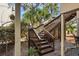 Wooden stairs offer access to this beautiful home at 1409 Dune Loft Villas, Seabrook Island, SC 29455