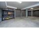 Spacious basement with painted walls, concrete floors, and shelving perfect for storage at 1427 Shell Fish Ct, Mount Pleasant, SC 29466