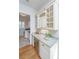 Butler's pantry with granite countertops, wine fridge, and ample cabinet space at 1427 Shell Fish Ct, Mount Pleasant, SC 29466