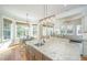 Eat-in kitchen with a granite island, stainless appliances, and a breakfast area with lots of natural light at 1427 Shell Fish Ct, Mount Pleasant, SC 29466