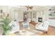Comfortable living room with coffered ceilings, fireplace and built-in shelving at 1427 Shell Fish Ct, Mount Pleasant, SC 29466