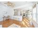 Bright living room flows into an open-concept kitchen with modern appliances, granite counters, and a breakfast nook at 1427 Shell Fish Ct, Mount Pleasant, SC 29466
