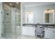 Spa-like main bathroom featuring dual vanities, a glass shower, neutral decor, and luxurious finishes at 1427 Shell Fish Ct, Mount Pleasant, SC 29466