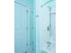 Modern shower with white marble tile and a rainfall shower head at 1427 Shell Fish Ct, Mount Pleasant, SC 29466