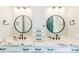 Bright bathroom with double sinks, marbled counter tops and a stylish lighted round mirrors above the vanity at 143 Harvest Way, Walterboro, SC 29488