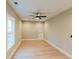 Bright bedroom with hardwood floors, neutral walls, ceiling fan and a large window at 143 Harvest Way, Walterboro, SC 29488