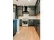 Kitchen boasting gray cabinets, white countertops, and stainless steel appliances at 143 Harvest Way, Walterboro, SC 29488