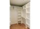 Spacious walk-in closet equipped with built-in shelving and rods for optimal storage and organization at 143 Harvest Way, Walterboro, SC 29488