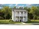 Charming two-story home boasts a welcoming front porch and landscaped yard, creating an inviting curb appeal at 1437 Clay Field Trl, Summerville, SC 29485