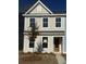 Charming two-story home with beige siding, white trim, and a well-manicured front yard at 145 Cantona Dr, Summerville, SC 29483