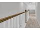 Upstairs hallway featuring wood and white banister, leading to bedrooms at 145 Cantona Dr, Summerville, SC 29483