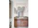 Bathroom with a vanity, decorative mirror and a shower with a patterned curtain at 1481 Center Street Ext # 601, Mount Pleasant, SC 29464