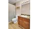 Bathroom with a vanity, decorative mirror and a shower with a white curtain at 1481 Center Street Ext # 601, Mount Pleasant, SC 29464