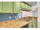 Kitchen sink and cabinets at 1481 Center Street Ext # 601, Mount Pleasant, SC 29464