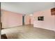 A spacious living room area offering a view of the partial kitchen and entry to the bedroom at 1481 Center Street Ext # 601, Mount Pleasant, SC 29464