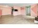 Spacious living room with view of the partial kitchen and hallway entrance at 1481 Center Street Ext # 601, Mount Pleasant, SC 29464