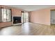 Bright living room with a fireplace and sliding doors that let in natural light at 1481 Center Street Ext # 601, Mount Pleasant, SC 29464