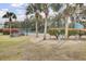 On-site Tennis Courts with palms, foliage and a bicycle rack at 1481 Center Street Ext # 601, Mount Pleasant, SC 29464