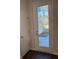 Patio access through glass door in room with dark floors at 155 Cantona Dr, Summerville, SC 29483