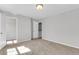 This bedroom features neutral walls, plush carpeting, and two entryways at 157 Cantona Dr, Summerville, SC 29483