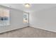 This bedroom features neutral walls, plush carpeting, and bright windows for natural light at 157 Cantona Dr, Summerville, SC 29483