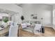 Bright living room area featuring vaulted ceilings, neutral decor, and hardwood floors at 157 Cantona Dr, Summerville, SC 29483