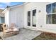 Relaxing patio with seating, a door, and large window that allows for natural light and backyard views at 157 Cantona Dr, Summerville, SC 29483