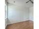 This bright bedroom features neutral walls, hardwood floors, and a ceiling fan at 158 Commons Way, Goose Creek, SC 29445