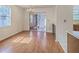 Dining room features hardwood floors and a chandelier with sliding glass doors at 158 Commons Way, Goose Creek, SC 29445