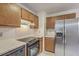 This kitchen features stainless steel appliances and laminate countertops at 158 Commons Way, Goose Creek, SC 29445