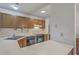 This kitchen features laminate countertops and stainless steel appliances at 158 Commons Way, Goose Creek, SC 29445