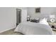 Relaxing bedroom featuring neutral tones, a comfortable bed with decorative pillows, and an adjacent bathroom at 159 Cantona Dr, Summerville, SC 29483
