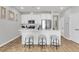 Kitchen with island, breakfast bar, stainless steel appliances, and tile backsplash at 159 Cantona Dr, Summerville, SC 29483