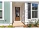 Inviting front entrance featuring a stylish wooden door and visible house number at 161 Cantona Dr, Summerville, SC 29483