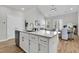 Kitchen island with granite countertop, ample cabinet space, and stainless steel dishwasher at 161 Cantona Dr, Summerville, SC 29483