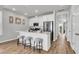 Open kitchen with a center island, seating for three, stainless appliances and plenty of natural light at 161 Cantona Dr, Summerville, SC 29483