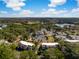 Aerial view of the community and tennis courts surrounded by mature trees and landscaping at 1638 Live Oak Park, Seabrook Island, SC 29455