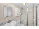 Well-lit bathroom with a glass door shower and neutral-toned vanity with granite countertop at 1638 Live Oak Park, Seabrook Island, SC 29455