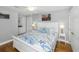 Bright bedroom with ensuite vanity, white furniture and light gray paint at 1638 Live Oak Park Park, Seabrook Island, SC 29455