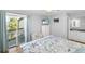 Comfortable bedroom with balcony, vanity, dresser, and bright light at 1638 Live Oak Park, Seabrook Island, SC 29455