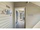 Inviting entrance featuring seaside decor and sunlight streaming through glass doors at 1638 Live Oak Park, Seabrook Island, SC 29455