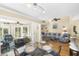 Open dining area and living room with sliding doors and cozy furnishings at 1638 Live Oak Park, Seabrook Island, SC 29455