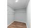 Walk-in closet with built-in shelving, providing ample storage space for clothes and accessories at 1657 Short Cut Rd, Cross, SC 29436