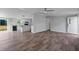 Open-concept living area with wood floors, connecting to the kitchen at 1657 Short Cut Rd, Cross, SC 29436
