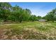 The expansive, lush yard offers ample space and outdoor opportunities at 1657 Short Cut Rd, Cross, SC 29436
